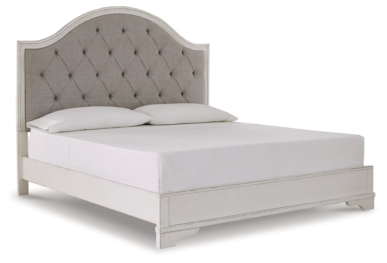 Brollyn King Upholstered Panel Bed with Mirrored Dresser